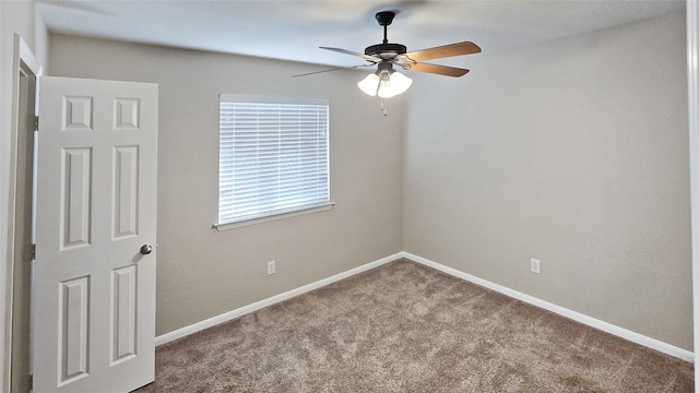 carpeted empty room with ceiling fan