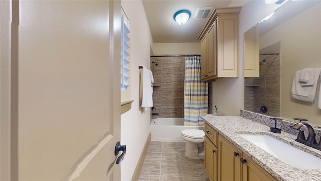 full bathroom featuring shower / tub combo with curtain, vanity, and toilet