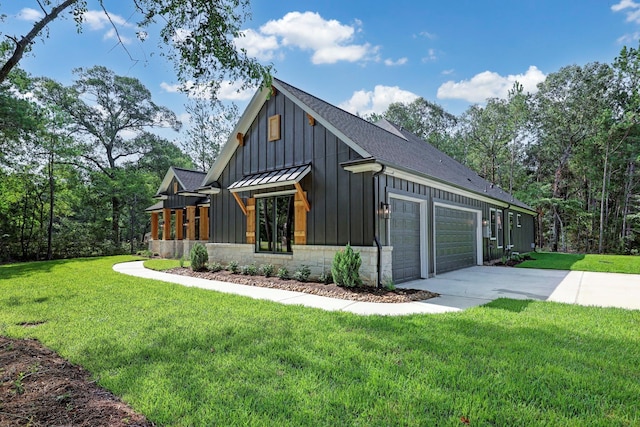 view of home's exterior featuring a lawn and a garage