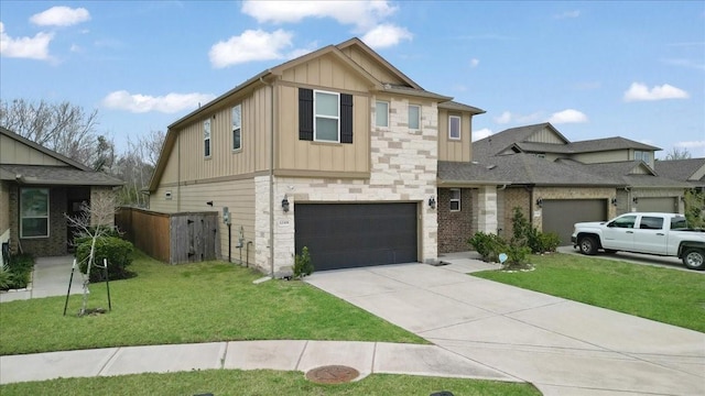 view of front of home with a garage and a front yard