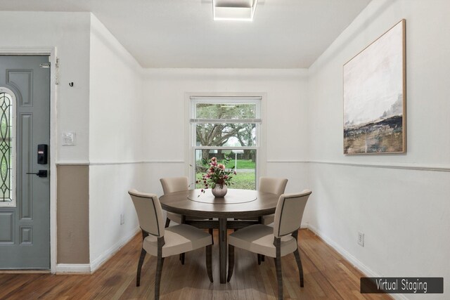 dining room featuring hardwood / wood-style flooring