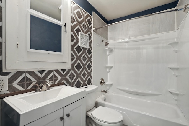 full bathroom featuring decorative backsplash, vanity, toilet, and tub / shower combination