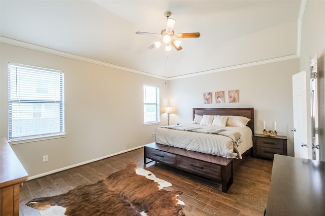 bedroom with lofted ceiling, dark hardwood / wood-style flooring, ceiling fan, and crown molding