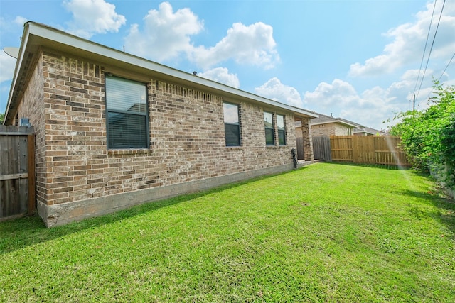 view of property exterior featuring a yard