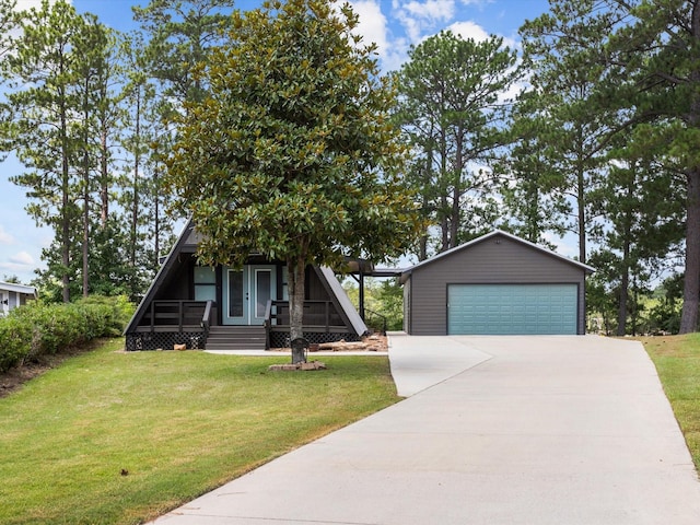 view of front of home featuring an outdoor structure, a front lawn, a porch, and a garage