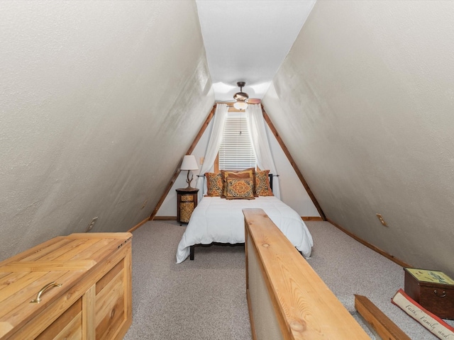 bedroom featuring carpet floors and vaulted ceiling