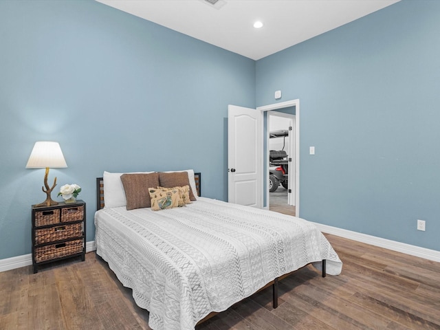 bedroom featuring dark wood-type flooring