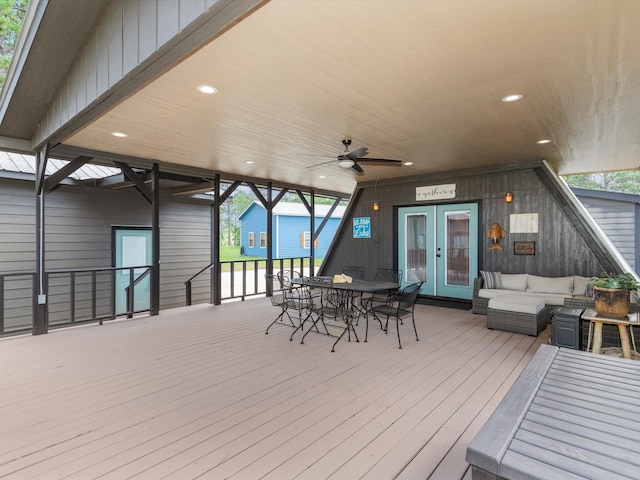 deck featuring outdoor lounge area and french doors