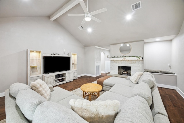 living room featuring ceiling fan, beamed ceiling, dark wood-type flooring, and high vaulted ceiling