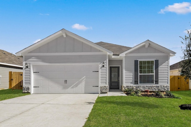 single story home featuring a front yard and a garage