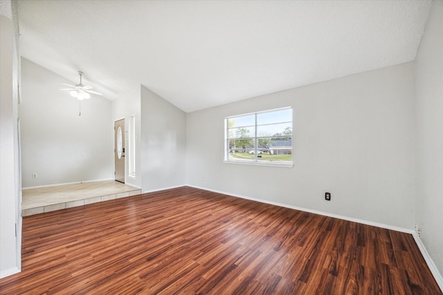 unfurnished room with wood-type flooring, ceiling fan, and lofted ceiling