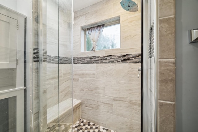 bathroom featuring an enclosed shower