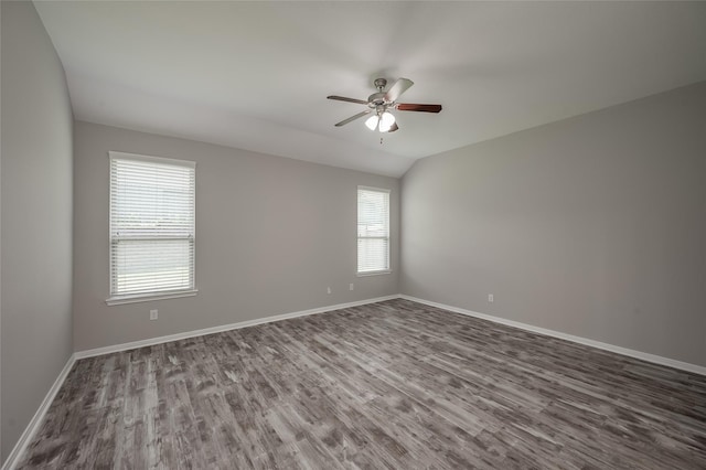 unfurnished room featuring hardwood / wood-style flooring, ceiling fan, and lofted ceiling