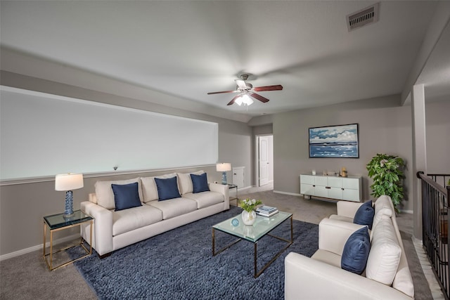 living room featuring ceiling fan and carpet