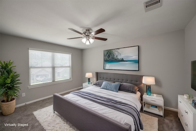 carpeted bedroom with ceiling fan