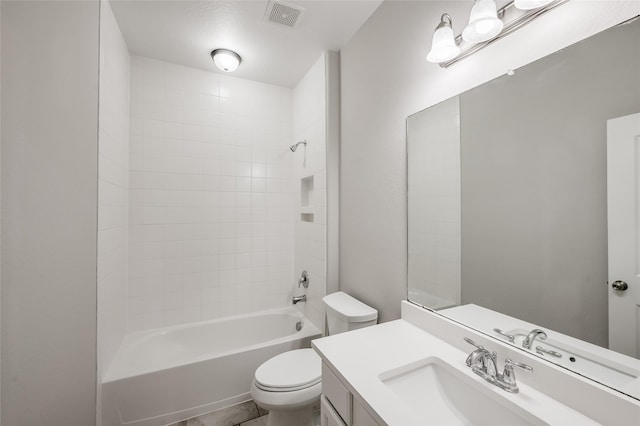 full bathroom featuring shower / bathing tub combination, vanity, and toilet