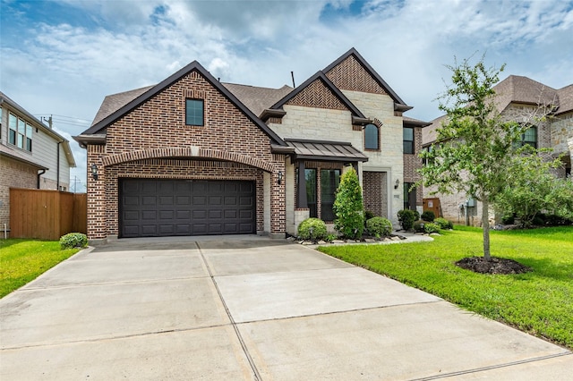 view of front facade featuring a front lawn and a garage