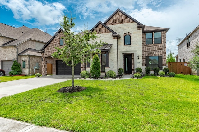 view of front facade featuring a front yard and a garage