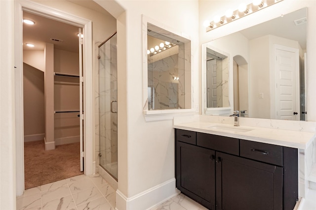 bathroom featuring vanity and walk in shower