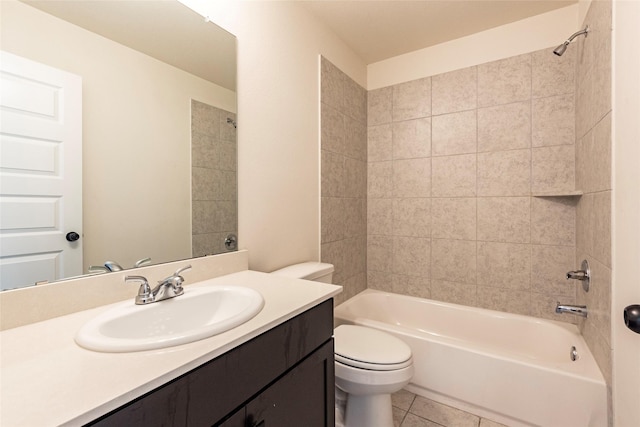 full bathroom featuring tile patterned flooring, vanity, tiled shower / bath combo, and toilet