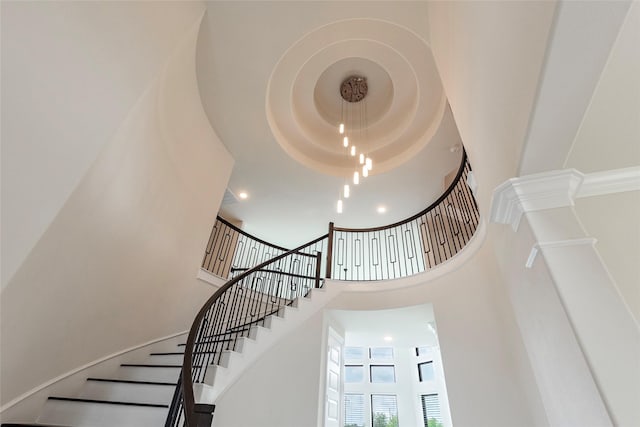 stairs with a towering ceiling