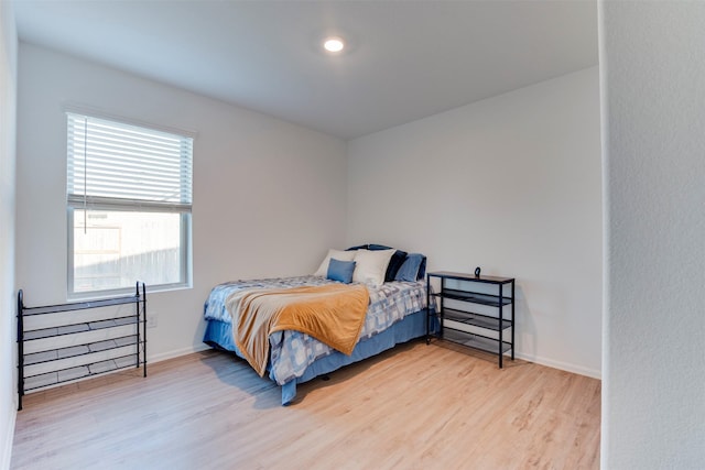 bedroom with light wood-type flooring