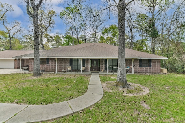 ranch-style home with a front lawn