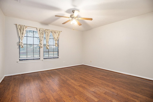 unfurnished room featuring hardwood / wood-style flooring and ceiling fan