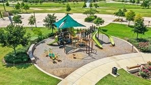 view of property's community featuring a playground