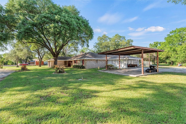 view of yard featuring a carport