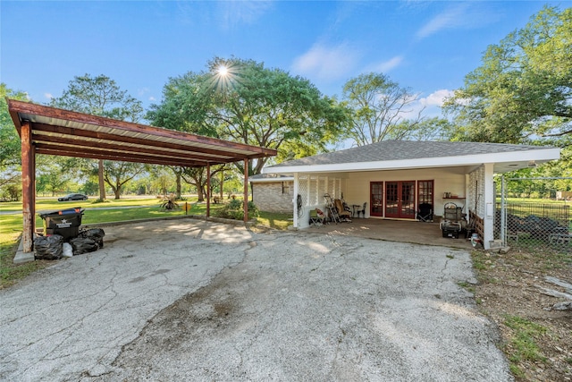 view of parking with a carport