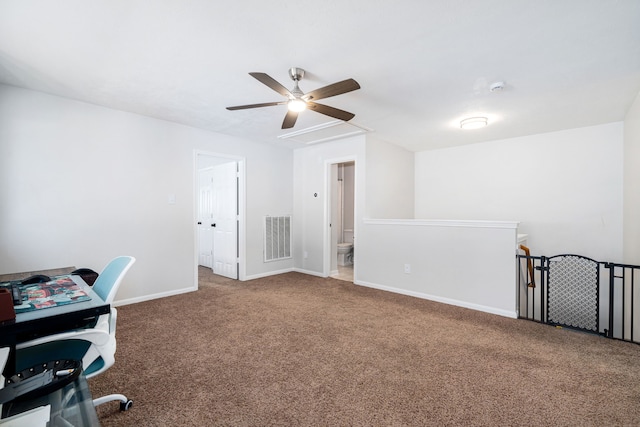 office with ceiling fan and carpet floors