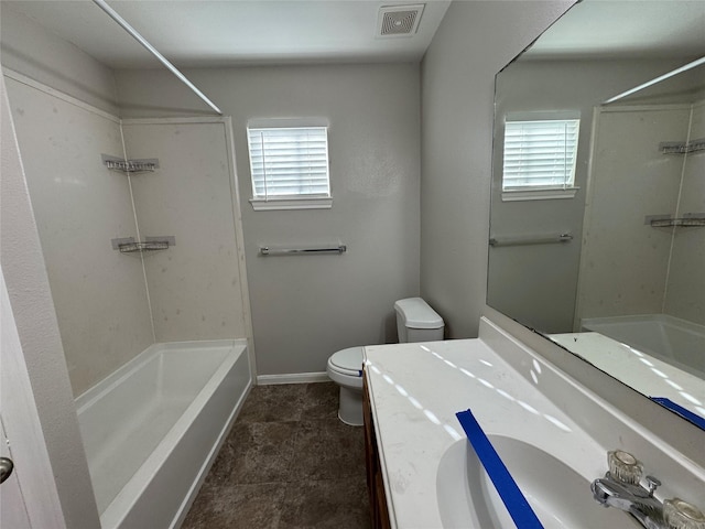 full bathroom featuring toilet, vanity, a wealth of natural light, and tub / shower combination