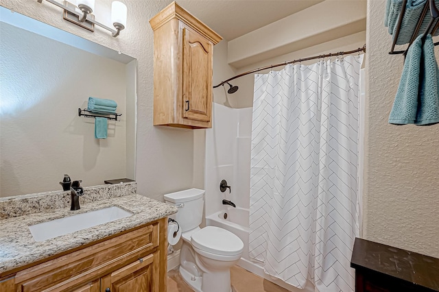 full bathroom featuring shower / tub combo with curtain, vanity, and toilet