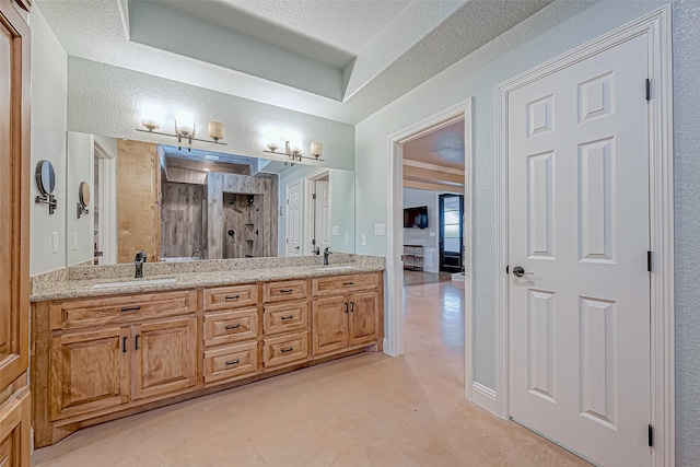 bathroom featuring vanity, a shower, and concrete floors