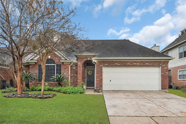 ranch-style home with a garage and a front lawn