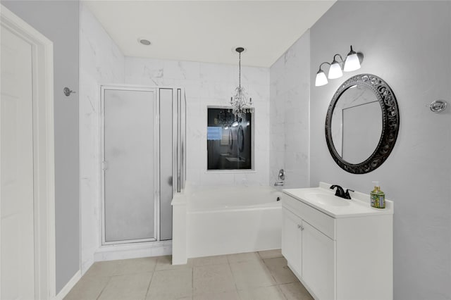 bathroom with vanity, tile patterned floors, independent shower and bath, and a notable chandelier