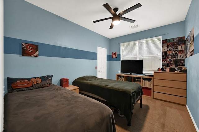 carpeted bedroom with ceiling fan