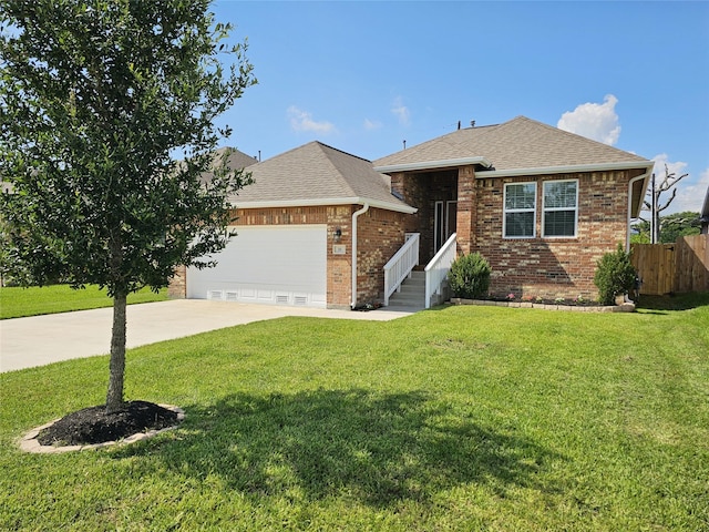 single story home featuring a front yard and a garage