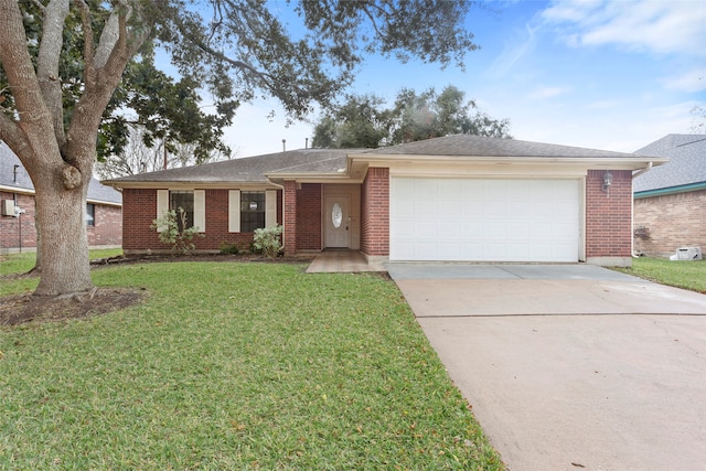 single story home featuring a front yard and a garage