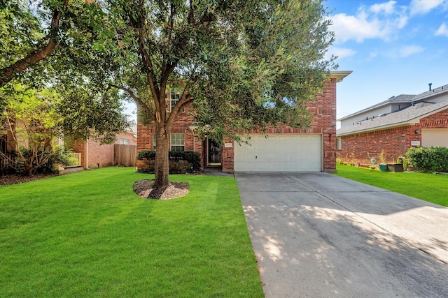 view of front of house featuring a garage and a front yard