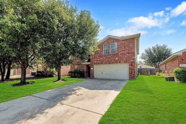 view of front property featuring a garage and a front yard