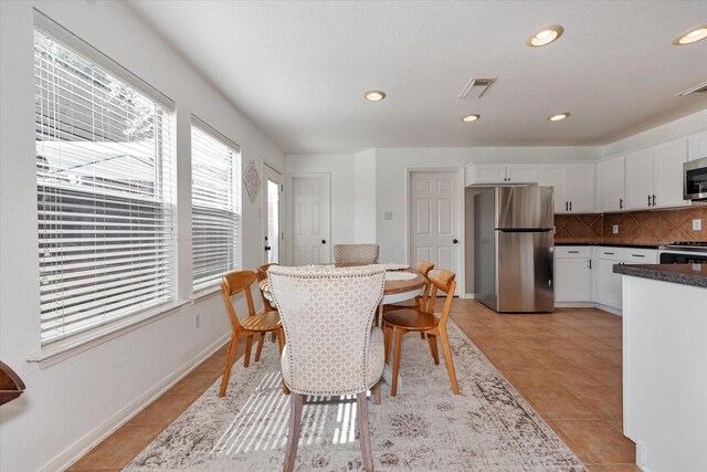 dining room with light tile patterned floors