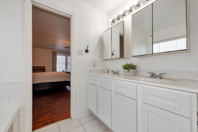 bathroom with vanity and tile patterned floors