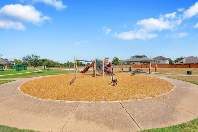 view of playground featuring a yard and a gazebo