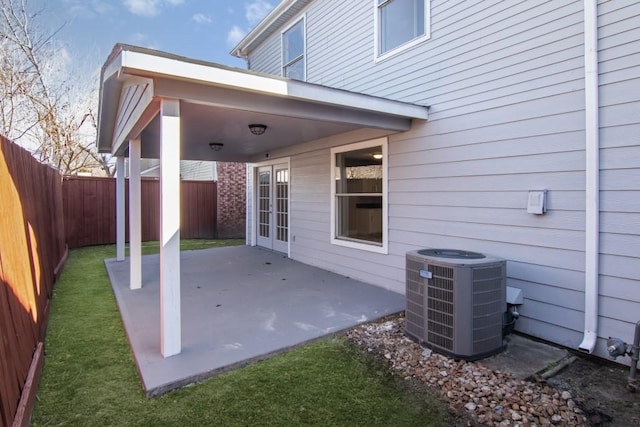 view of patio featuring central AC and french doors