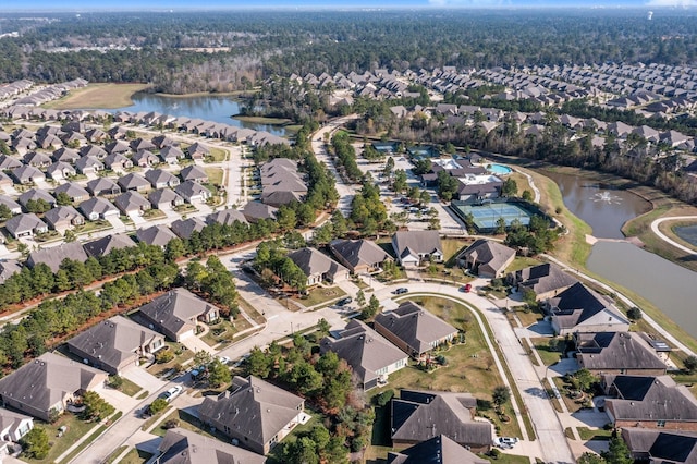 drone / aerial view with a water view