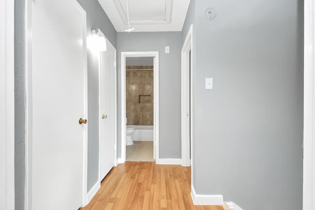 hall with light wood-type flooring