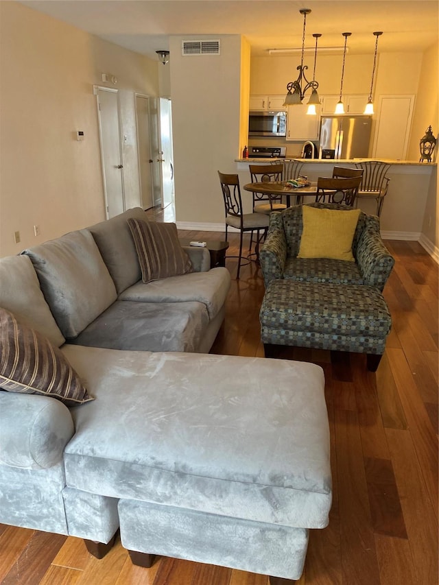 living room with hardwood / wood-style floors