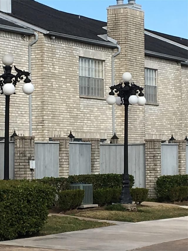 view of home's exterior with central AC